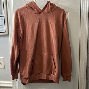 a maroon hoodie